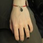 Evil Eye Black Hamsa pendant with Shema in Hebrew on a red string bracelet